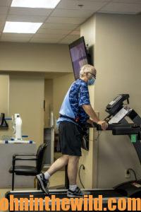 John walks on a treadmill