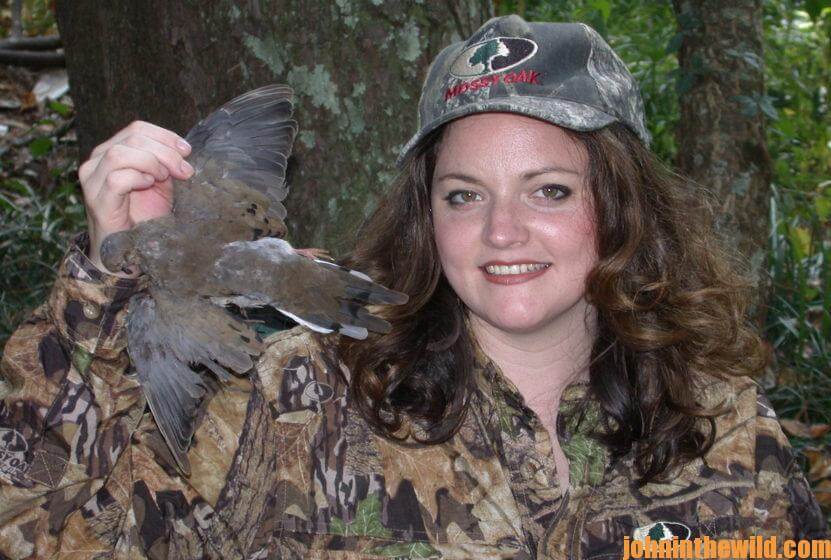 A hunter with her downed bird