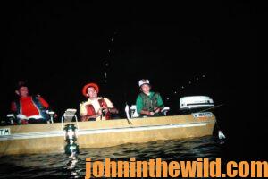 A group of fishermen looking to catch crappie at night