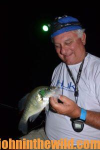Fisherman catches crappie at night