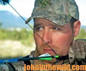 Elk hunter, J.R. Keller, prepares to shoot his bow and arrow.
