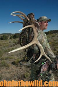 Hunter carrying elk
