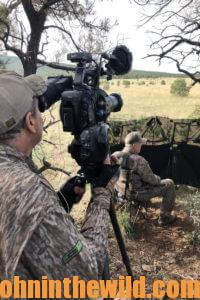 Videographer records as another hunter waits behind a blind