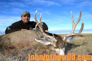 Troy poses with his downed deer