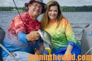 Two happy anglers pose with their fish