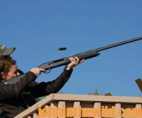A hunter shooting from a stand