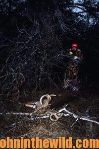 A hunter recovers his downed deer