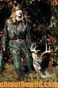 A hunter with her downed deer