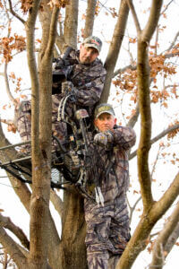 Mark and Terry Drury in a tree stand