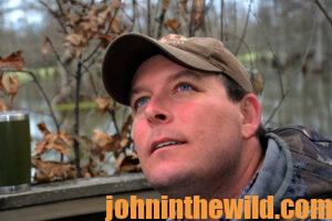 A hunter watches the air for waterfowl