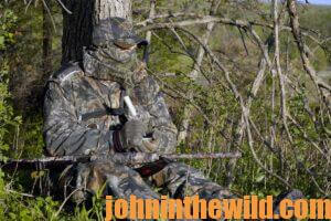 A turkey hunter on the watch for a gobbler