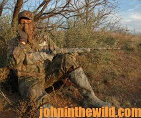 A hunter waits and calls for turkeys