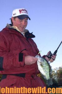 An angler shows off his crappie