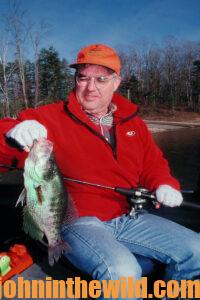 An angler shows off a crappie