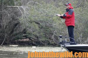 Kevin VanDam fishing from his boat in 2007 Bassmaster Classic Day 2 in Birmingham, Alabama.