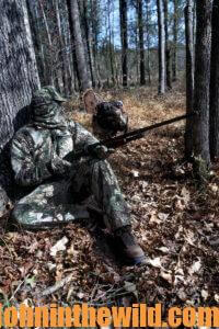 A hunter waits for a turkey to come into shooting range
