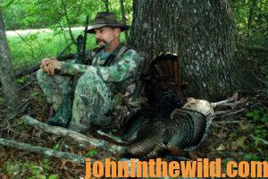 A hunter waits for a gobbler to approach