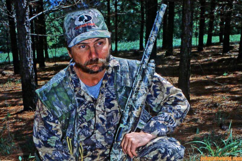 A hunter waits for a gobbler to approach