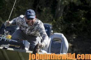 A fisherman out in a boat