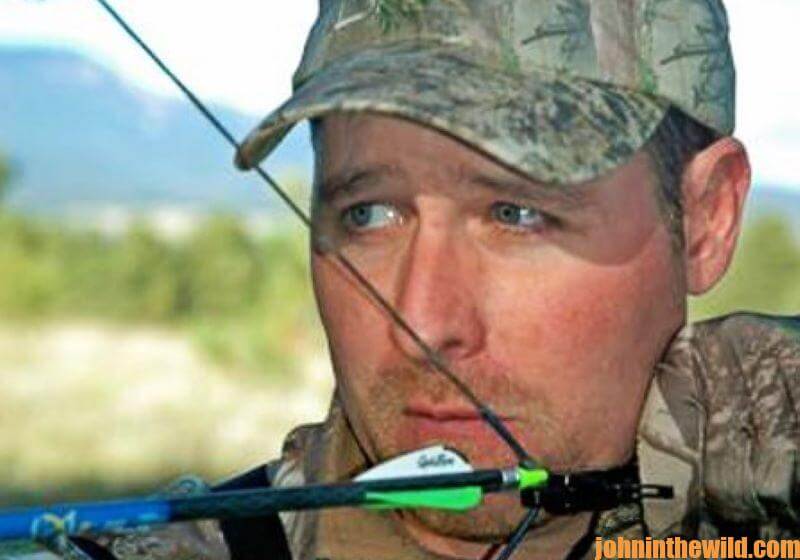 Elk hunter, J.R. Keller, prepares to shoot his bow and arrow.