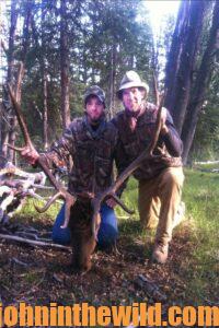 Karl Badger of Utah with a friend and one of their trophies