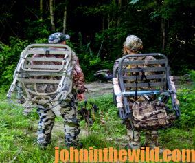 two hunters in the field on the lookout for deer