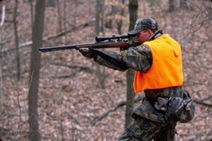 Deer hunter with his rifle