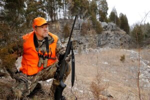 Deer hunter with his rifle