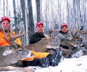 Deer hunters and their trophies