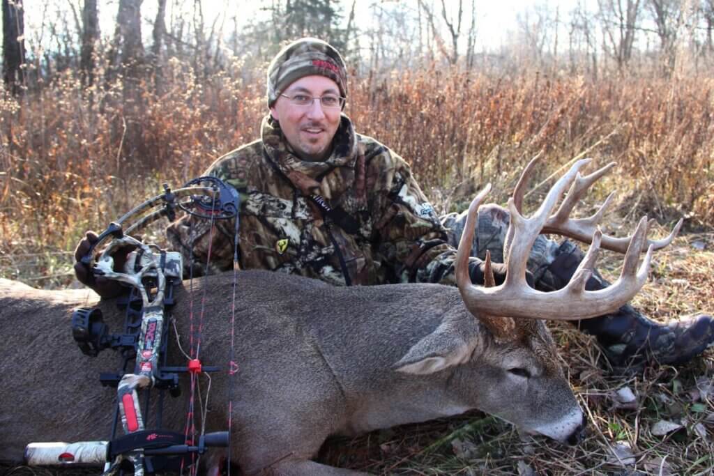 Hunter with his trophy deer