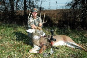 Deer hunter and his trophy