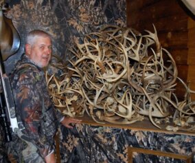 Dr. Robert Sheppard with his deer rack collection