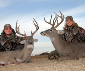 Jim Crumley and Dr. Grant Woods with their trophies