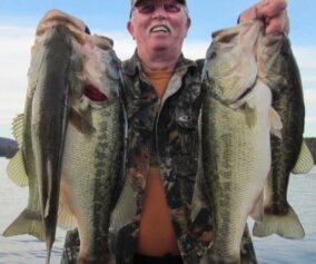 Gary Klein with two bass trophies
