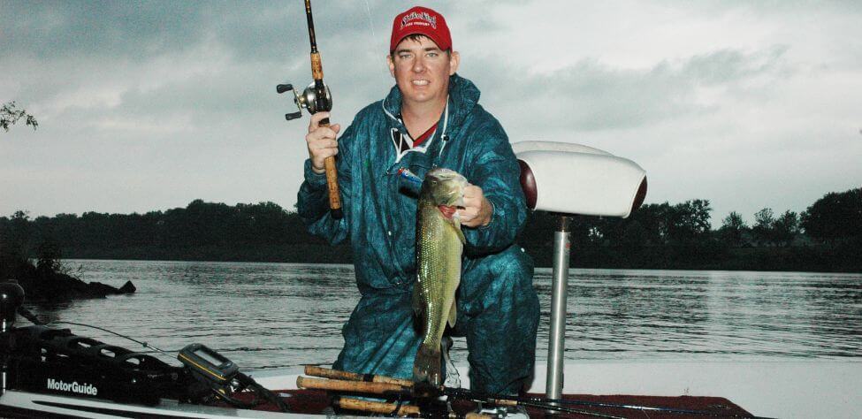 Bass fisherman with his trophy