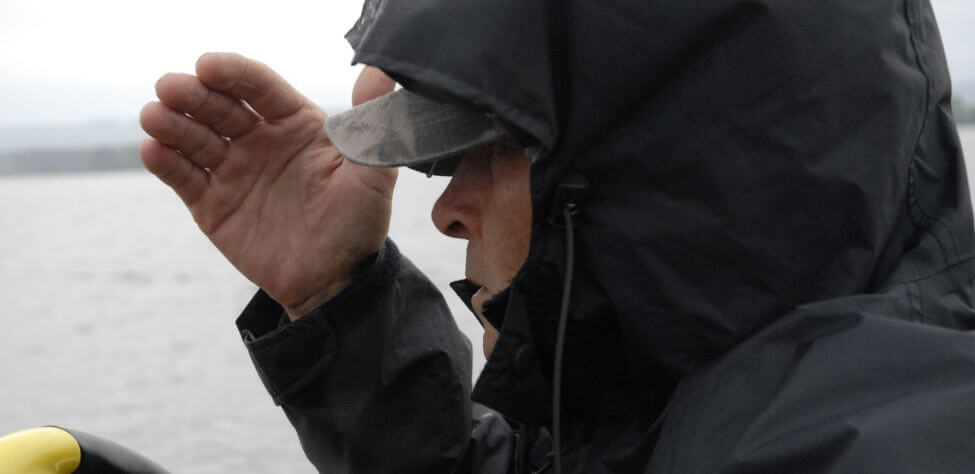 Gary Klein bass fishing in the rain