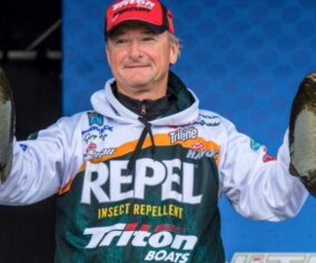Gary Klein with trophy bass at a tournament