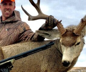 Hunter with his deer trophy