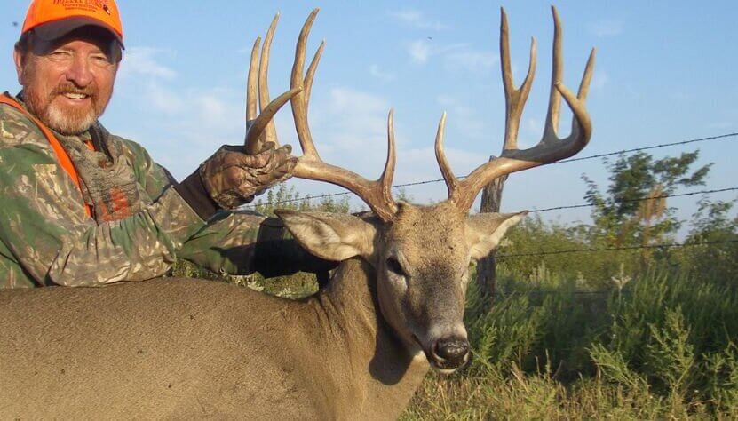 Deer hunter with his trophy