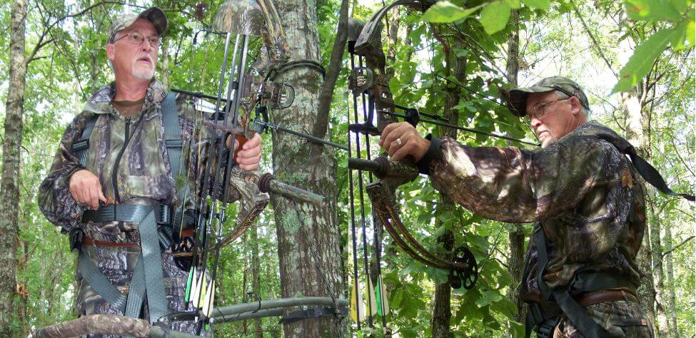 Bowhunters in tree stands
