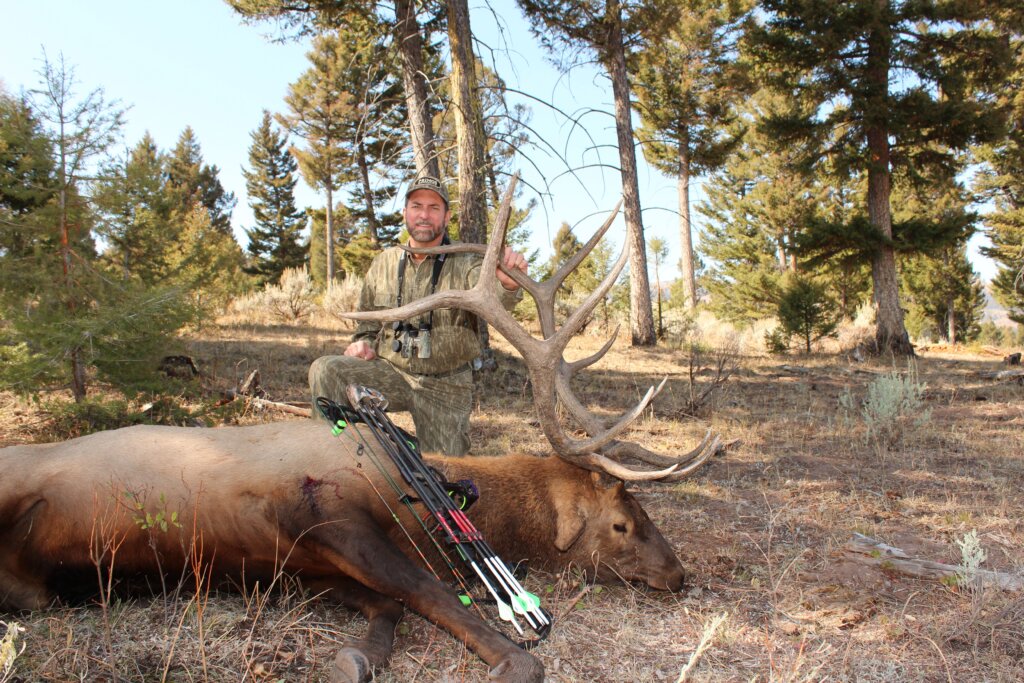 Hunter and his deer trophy