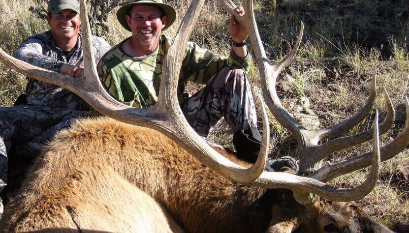 Elk hunters with their trophy