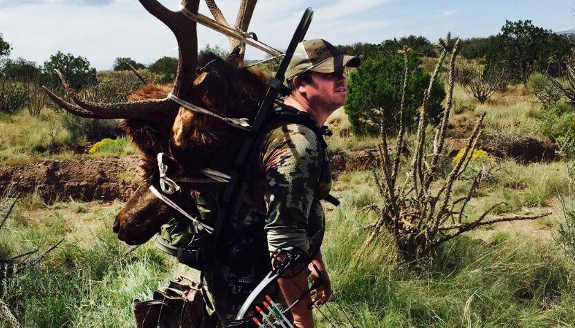 Elk hunter with his trophy